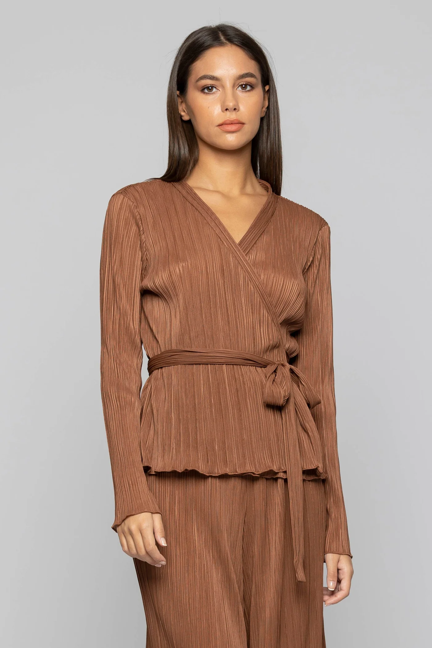 BLUSA A MANICHE LUNGHE PLISSETTATA CON FUSCIACCA