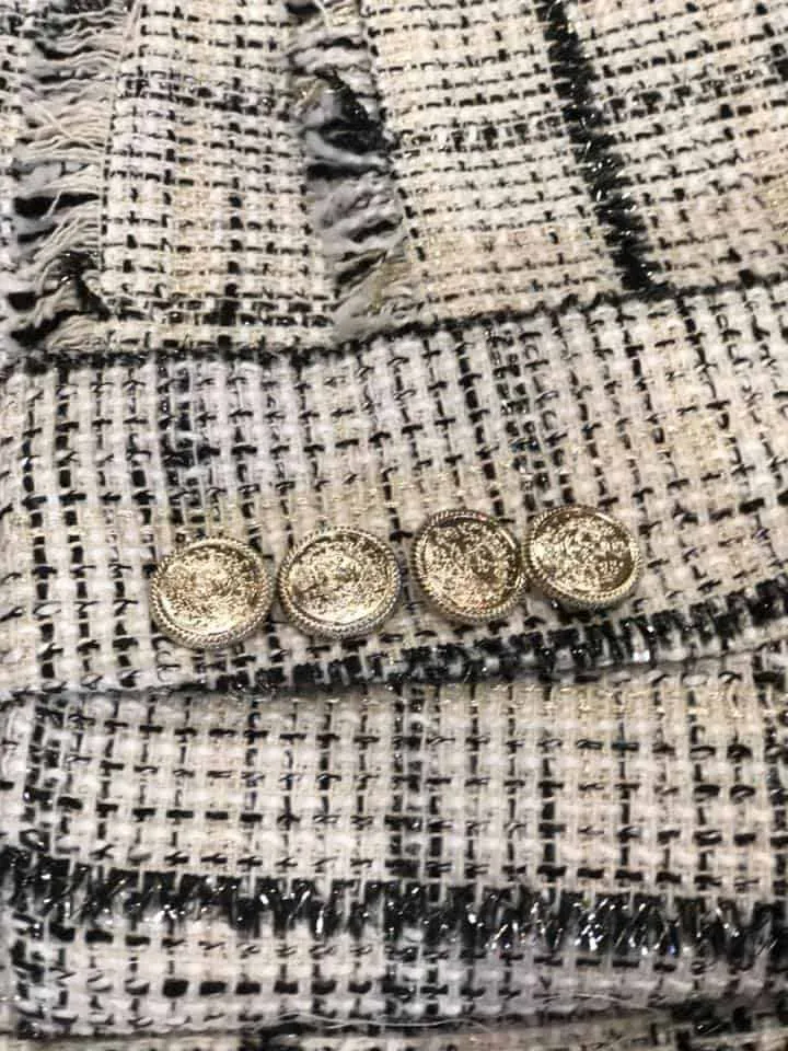 Completo elegante in tessuto bouclé