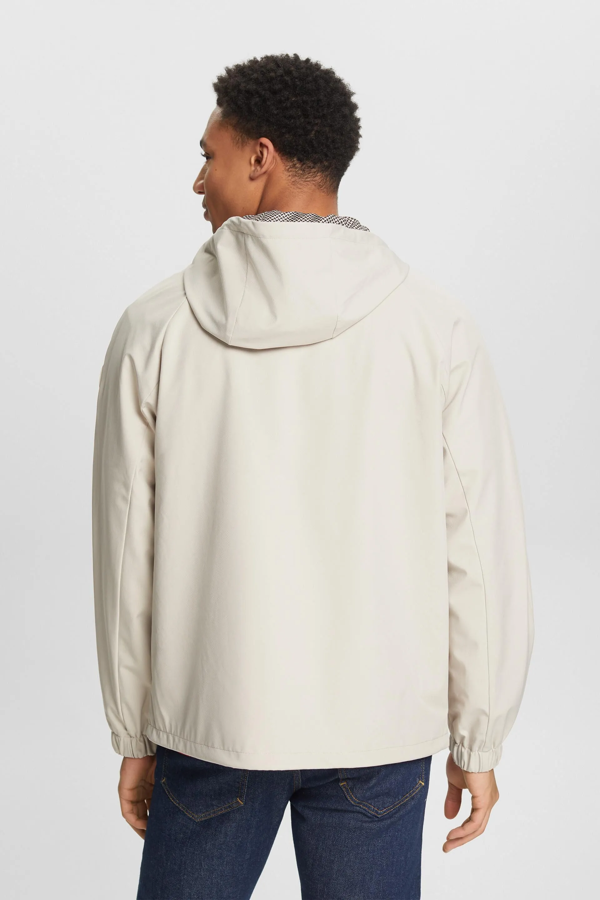 Giacca softshell con cappuccio