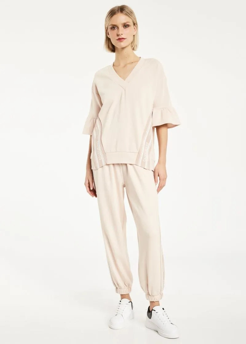 Pantaloni con logo