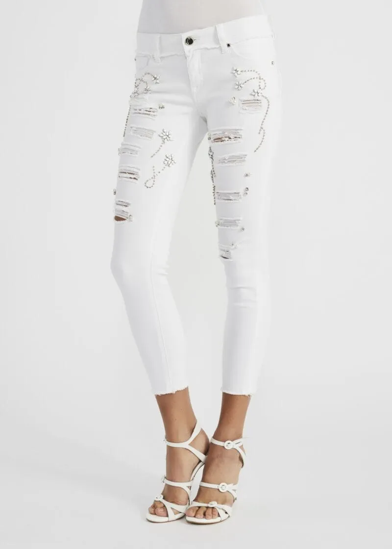 Pantaloni cropped con abrasioni