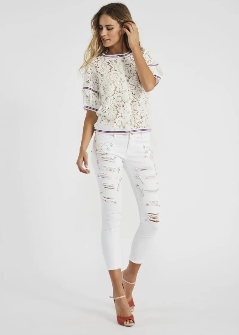 Pantaloni cropped con abrasioni