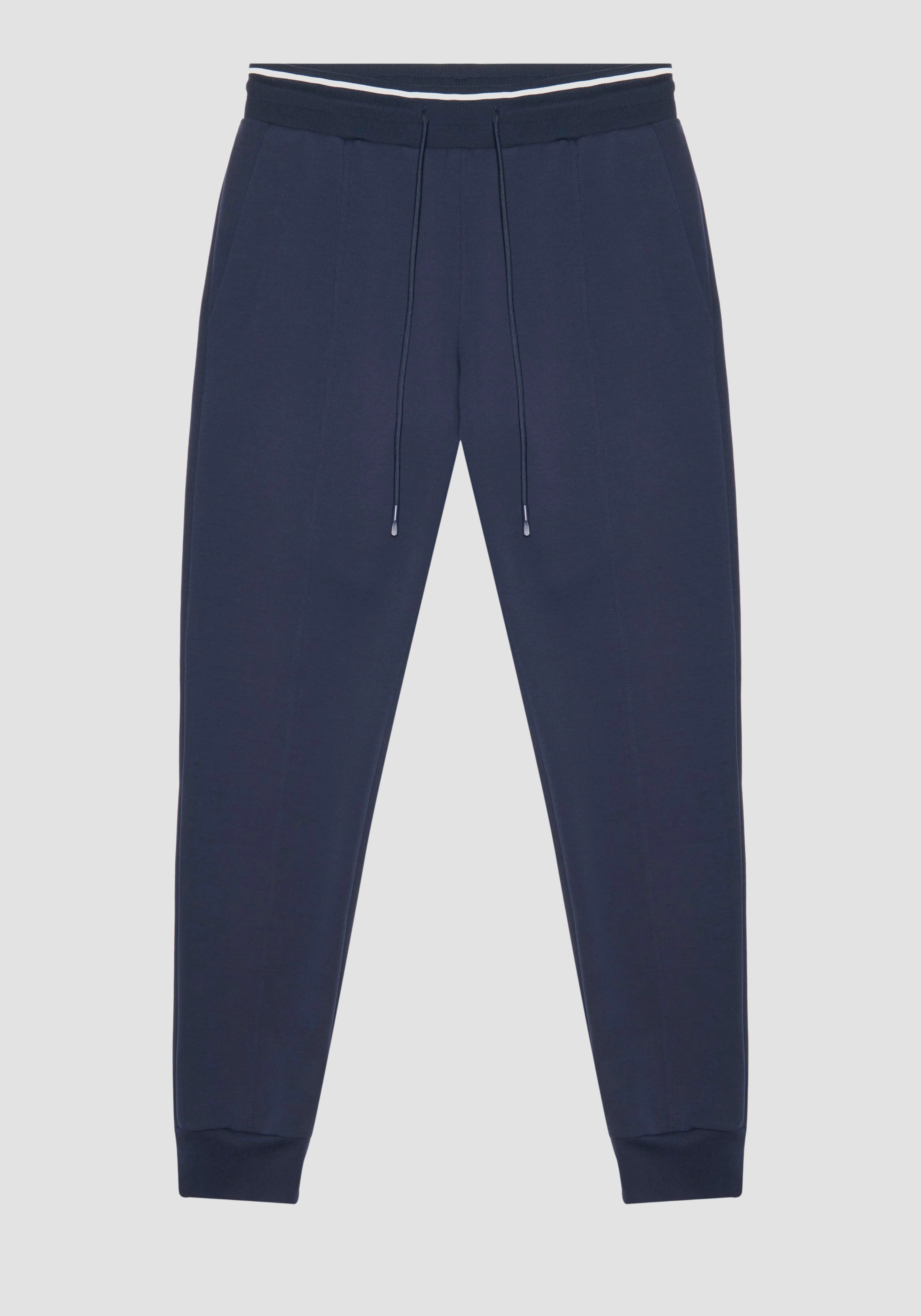 PANTALONI SLIM FIT IN FELPA MISTO COTONE CON PATCH LOGATA