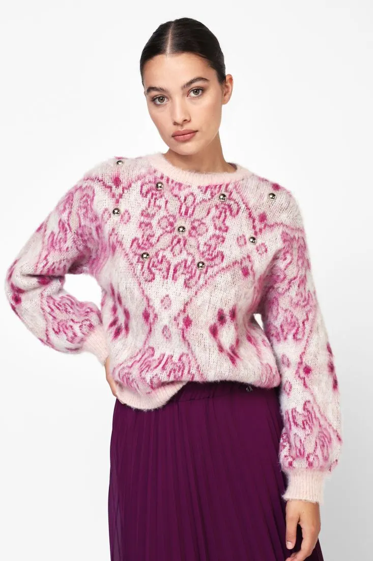  Sweater with unique decorative details    