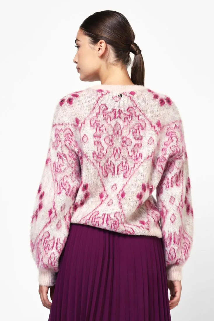  Sweater with unique decorative details    